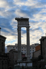 ruins and columns present in the city of rome in italy.