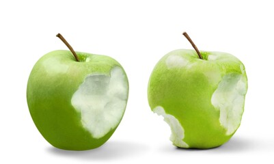 Fresh ripe bitten apples on the desk