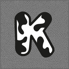 Cow style alphabet with black spots, letter K