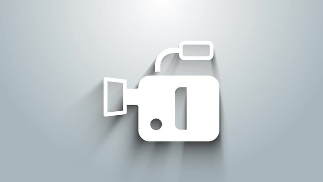 White Cinema camera icon isolated on grey background. Video camera. Movie sign. Film projector. 4K Video motion graphic animation