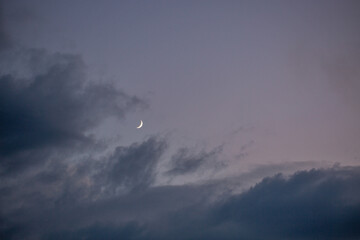 Dramatic evening sky with moon