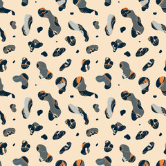 Painted vector pebbles on a beige background. Multicolored lines, stripes, spots.