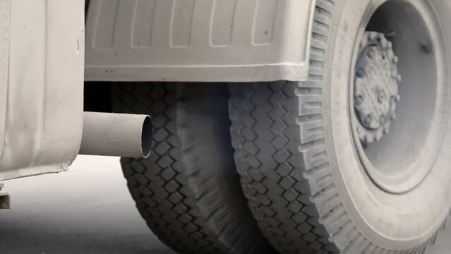 combustion products from the exhaust pipe of a large vehicle - smog, pollution