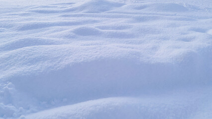 Natural winter background from snow falling on the ground