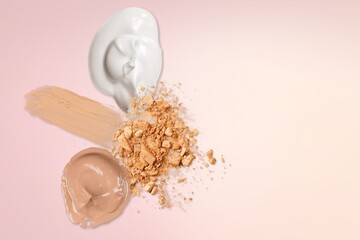 cosmetic smear of cream and powder on desk