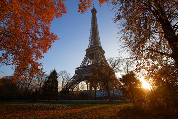 Scenic view of the Eiffel tower and Champ de Mars park on a beautiful and colorful autumn day .Paris. France .