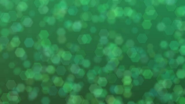 Motion graphics. forest green abstract defocused background, hexagon shape bokeh spots