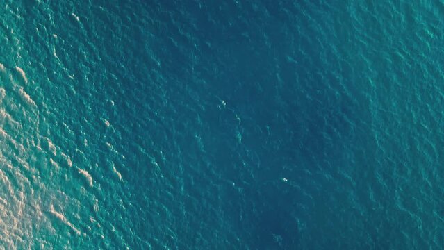 Sea surface with waves and ripples. Aerial top to down view, static shot