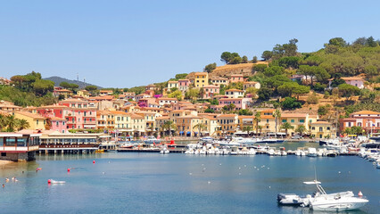 Panorama of city Porto Azzuro with colorful houses.