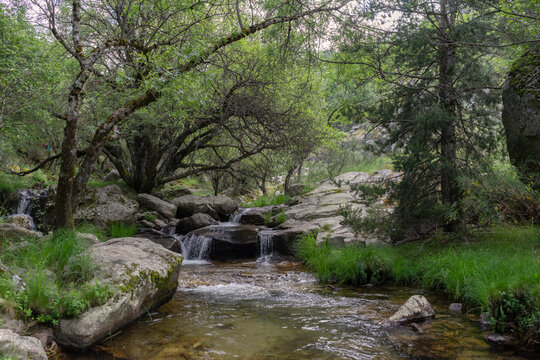 Waterfall in Rascafr&iacute;a on the purgatory route in the mountains of Madrid.