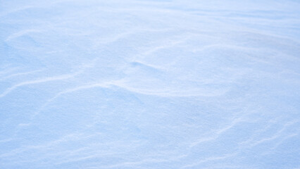 Natural winter background from snow falling on the ground