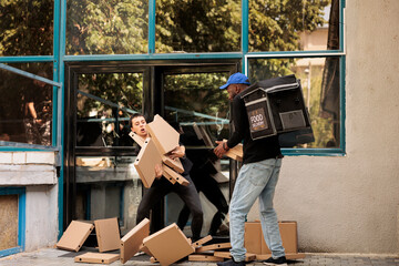 Confused client catching falling pizza boxes, clumsy courier dropping food order near office...