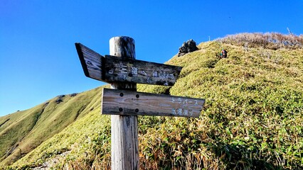 signpost in the mountains