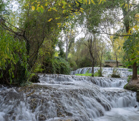 Incredible river forming waterfalls. Privileged place to enjoy nature and the environment in autumn.