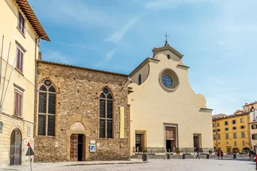 Papier Peint photo Lavable Florence Exterior view of Santo Spirito church and its cenacle, with rose window and yellow façade, in Oltrarno quarter, Florence city center, Tuscany, Italy