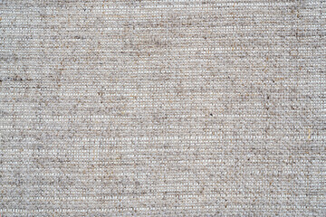 gray canvas texture with delicate mesh pattern as abstract background