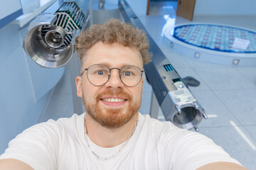 Man student engineer background fragment energy fuel uranium or thorium rod element of nuclear...