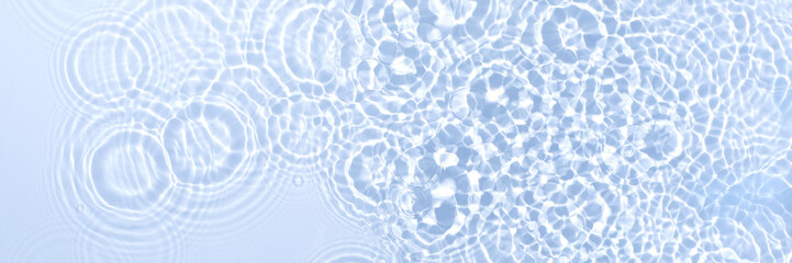 Blue water abstract banner with a clear transparent surface with droplet circles