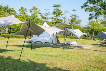 Camping tents on the park lawn