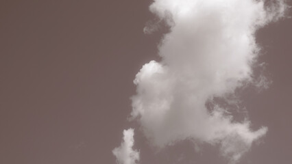 A large white cloud in a single cluster on beige gray background. Cloud cluster can be used for graphics jobs and resource