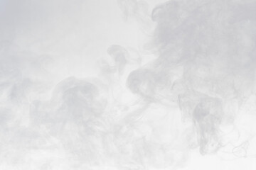 Dense Fluffy Puffs of White Smoke and Fog on black Background, Abstract Smoke Clouds, Movement...