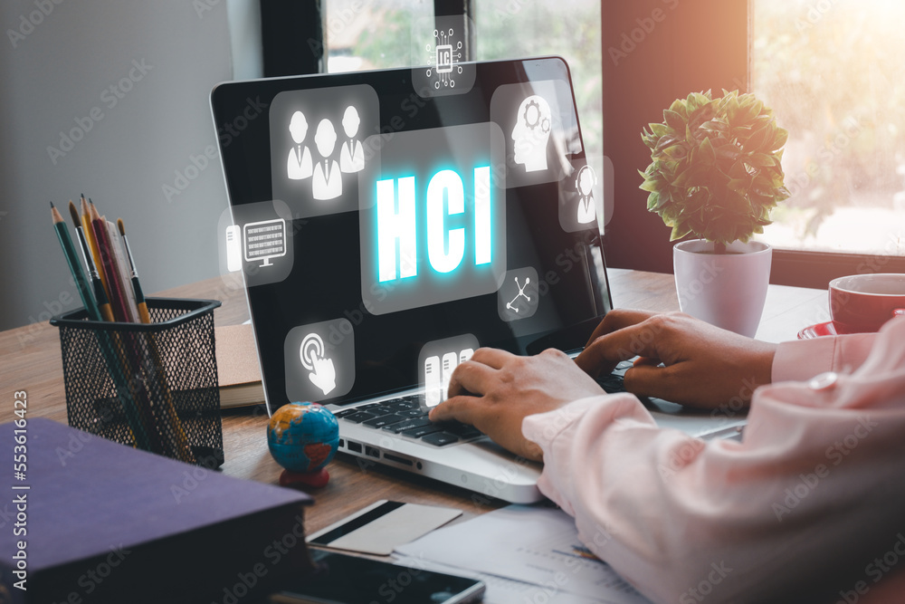 Poster hci concept, human computer interaction, person hand using computer on office desk with hci icon on 