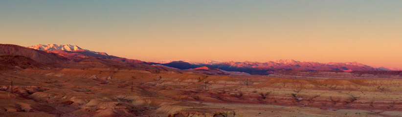 panoramic scenic mountain desert view at sunset in Morocco Atlas mountains