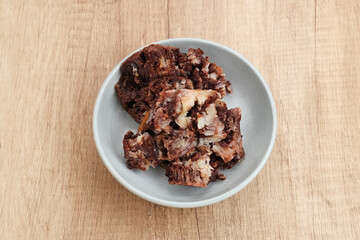 Kue Bikang or Carabikang is one of the traditional cakes typical of Central Java, Indonesia which is made from rice flour dough and coconut milk. Served in plate. 