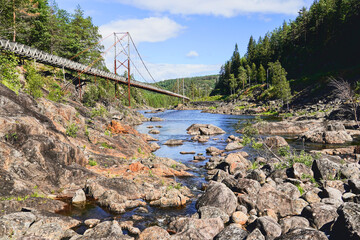 norway landscape, lumber slide bridge tommerrenna in Vennesla Steinsfoss