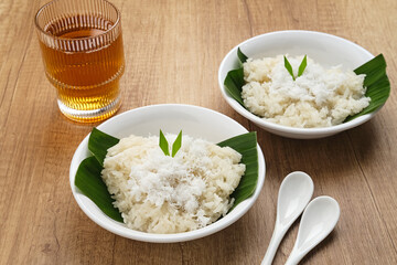 Ketan Kelapa Parut, Indonesian traditional snack, made from steamed glutinous rice and served with grated coconut

