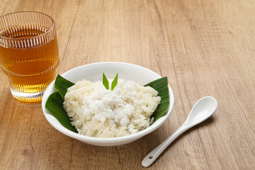 Ketan Kelapa Parut, Indonesian traditional snack, made from steamed glutinous rice and served with grated coconut
