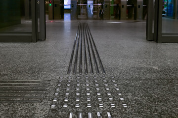 Floor tiles with tactile ground surface indicators, closeup