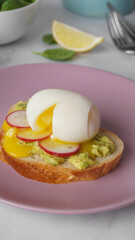 Tasty sandwich with boiled egg and radish on white table, closeup