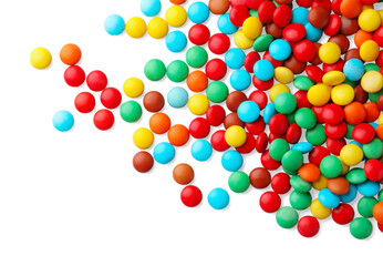 Many small colorful candies on white background, top view