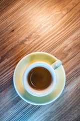 fresh tasty cup of espresso or americano coffee on the table in cafe