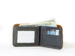 Dark blue leather wallet with dollar bills and credit card