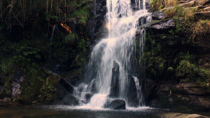 Fototapeta na wymiar Beautiful waterfall in Cabreia Portugal
