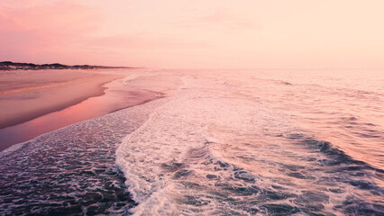 Aerial view of beach at sunset