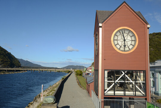Greymouth clocktower overlooks the Grey River and floodwall
