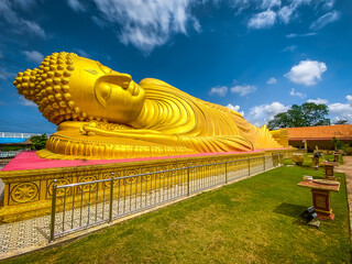 Wat Laem Pho temple with reclining golden Buddha in Songkhla, Thailand