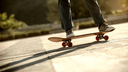 Asian woman skateboarder skateboarding in modern city © lzf