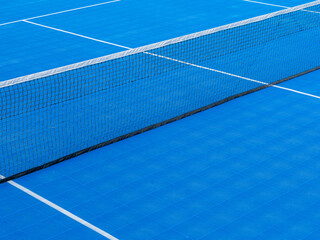 Empty blue tennis hard court
