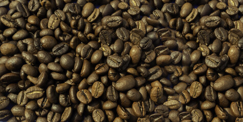 High Angle. A pile of roasted coffee beans. background pattern