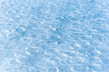 Colored ice. Abstract ice texture. Nature background. Sea ice. patterns on ice