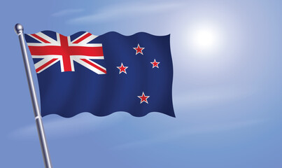 New Zealand flag against a blue sky