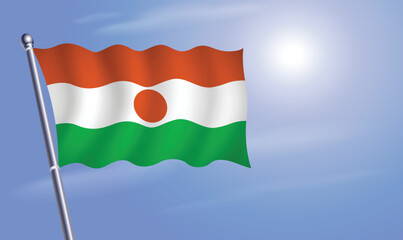 Fototapeta na wymiar Niger flag against a blue sky