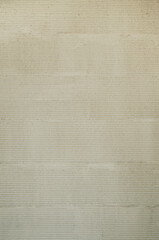 Traditional Japanese style plasterer wall background. Japanese comb striped patterned mortar cement texture.