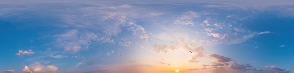 Panorama of a dark blue sunset sky with pink Cirrus clouds. Seamless hdr 360 panorama in spherical...