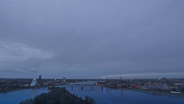 Hyperlapse Timelapse Over City as Night Lights Turn on