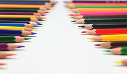 Color pencils isolated on white background; Close up, selective focus